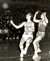 Cohen playing basketball, 1957