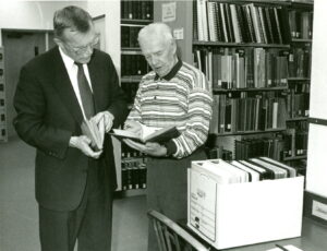 Raymond Vigue in Fogler Library's Special Collections Department, 1998