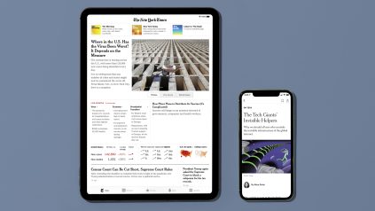 Photo of a tablet and cell phone side-by-side. Each displays the homepage of New York Times.